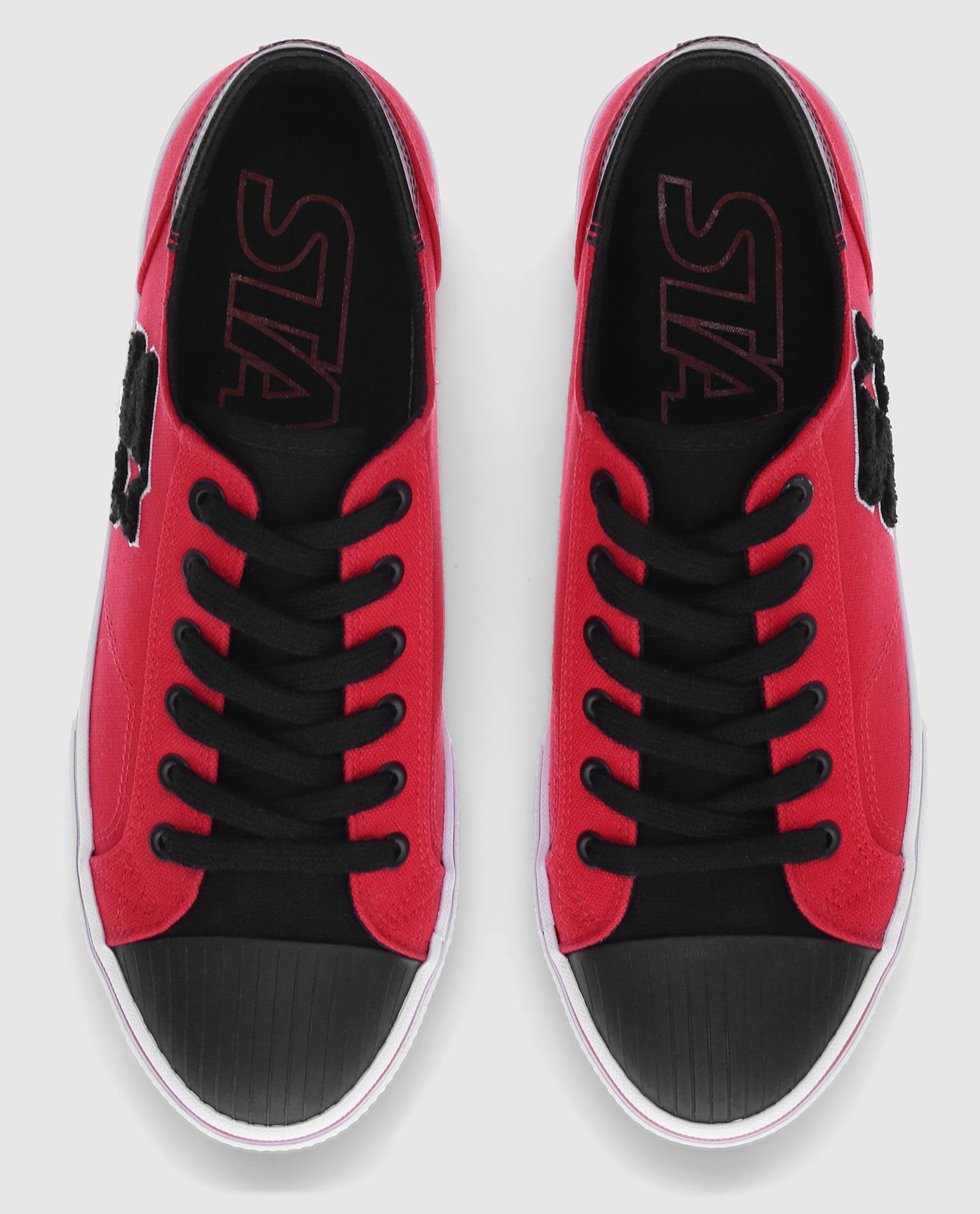 Top Angle Of Starter Tradition 71 Low Red Sneaker Pair | Red