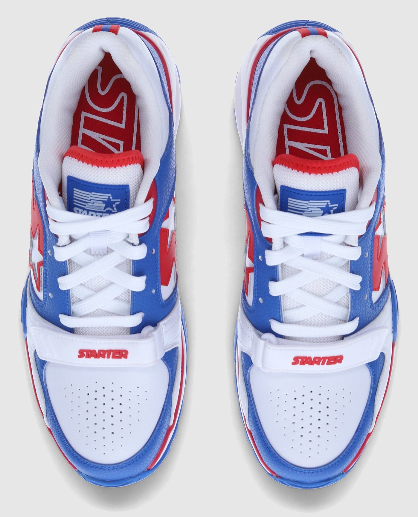 Top Angle Of Starter Team Trainer 92 Low Blue Sneaker Pair | Blue