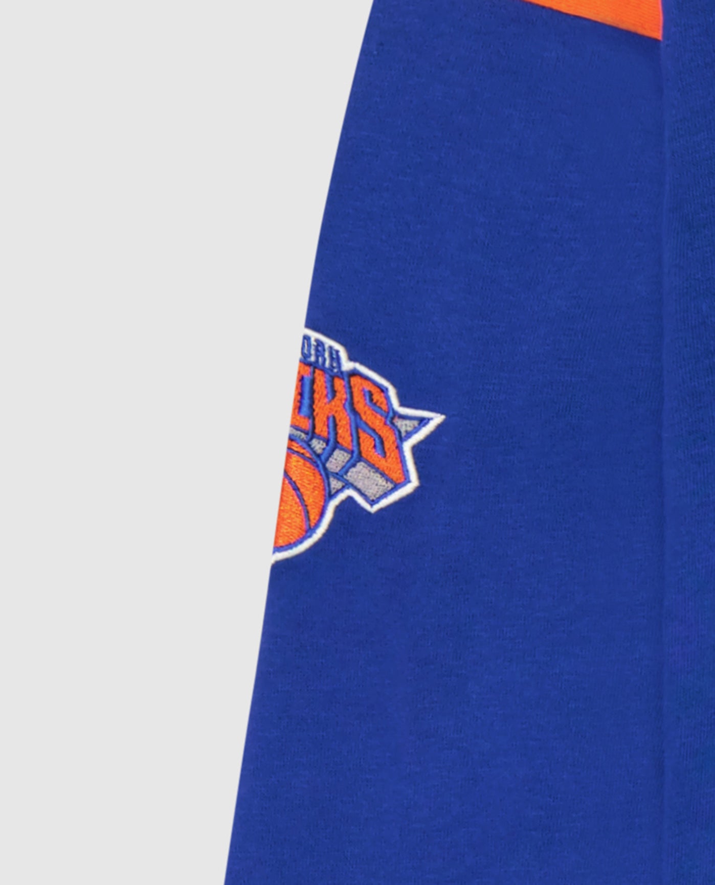 New York Knicks logo on the sleeves | Knicks Blue