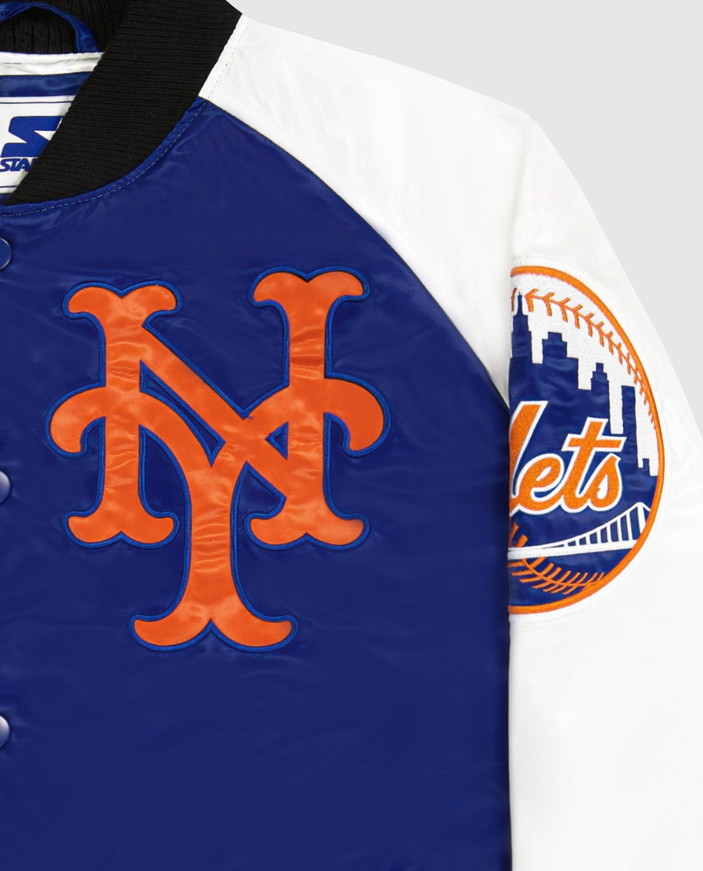 NY logo on top left chest and Mets logo on the sleeves | Mets Blue