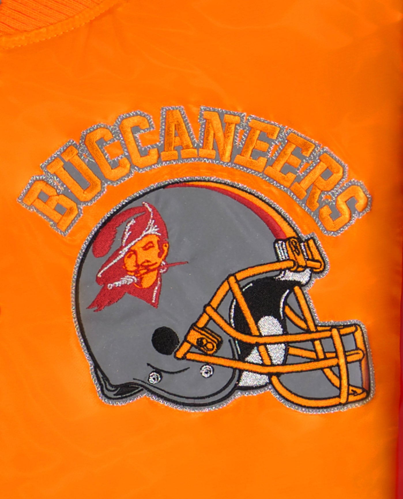 BUCCANEERS writing and helmet logo top left chest | Buccaneers Gold